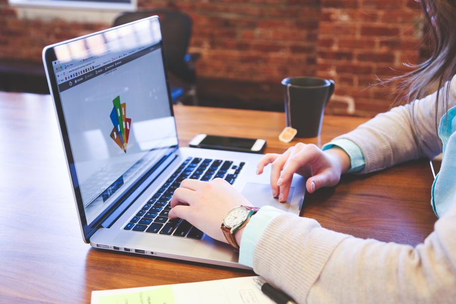 Woman Using Macbook